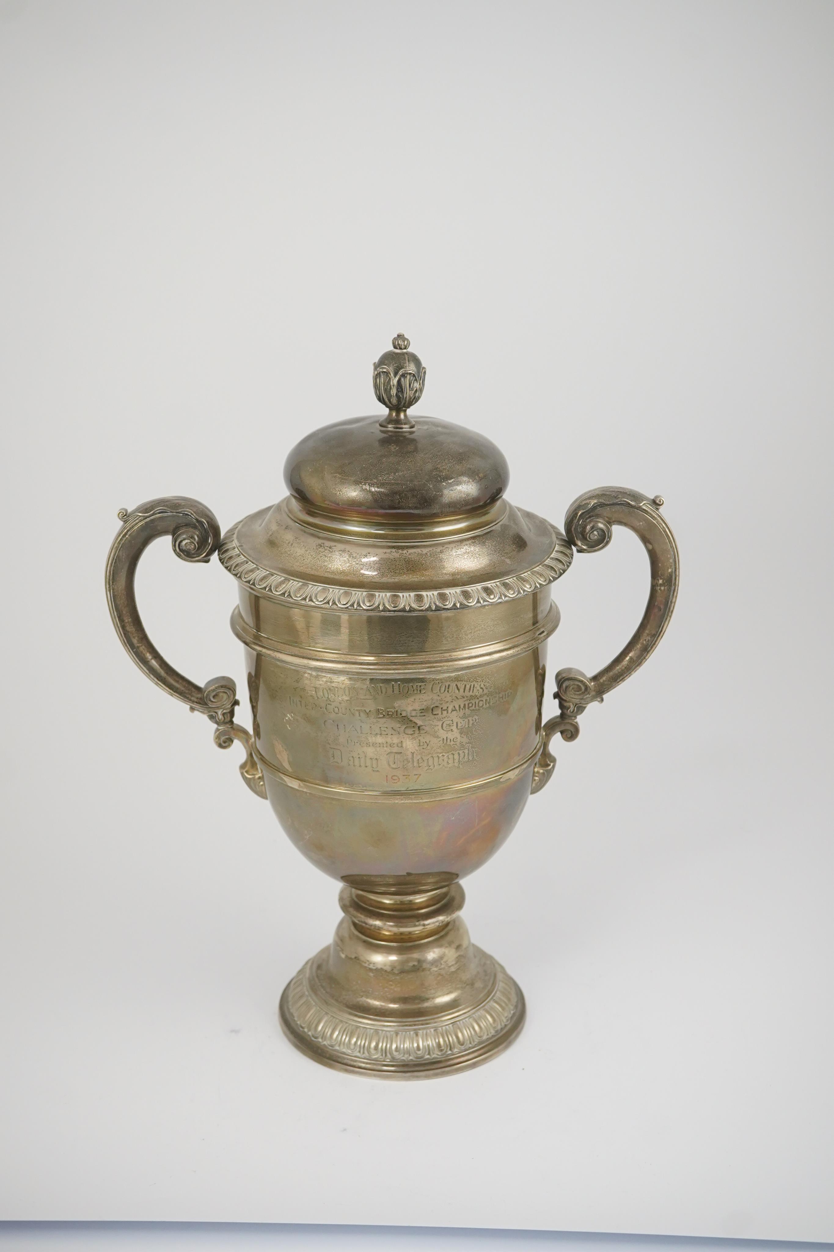 A George V silver two handled presentation trophy cup and cover by Hunt & Roskell Ltd (late Storr & Mortimer)